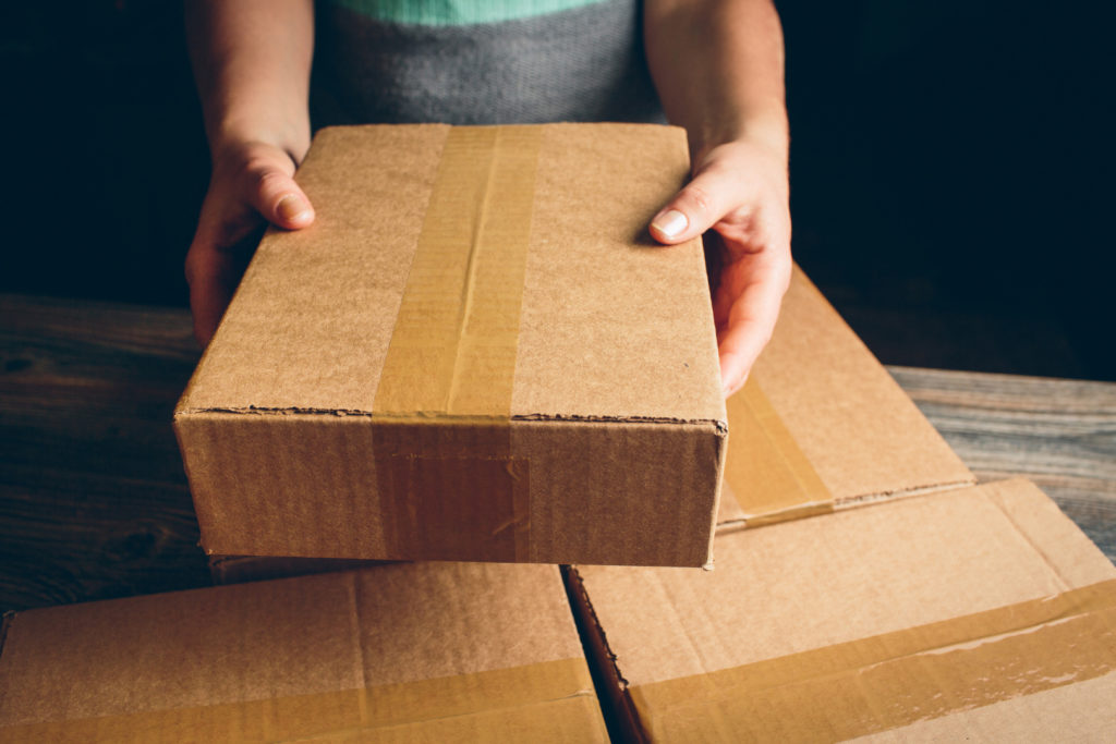 Small batch Copacker delivering items packaged in cardboard boxes